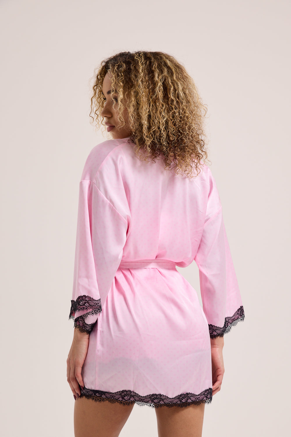 Displays a model wearing the Cherry Blossom 'Juicy' branded heart lace trim robe 