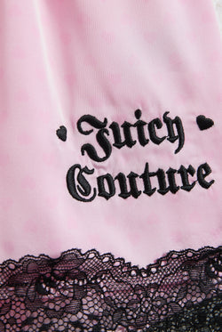Displays the cherry blossom heart lace 'Juicy' branded satin pyjama set featuring the Juicy Couture branding 