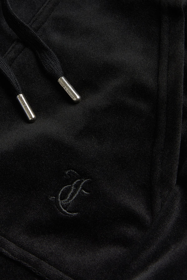 Displays the Black Low rise flare pocket 'Juicy' branded classic velour track pant featuring the Juicy Logo