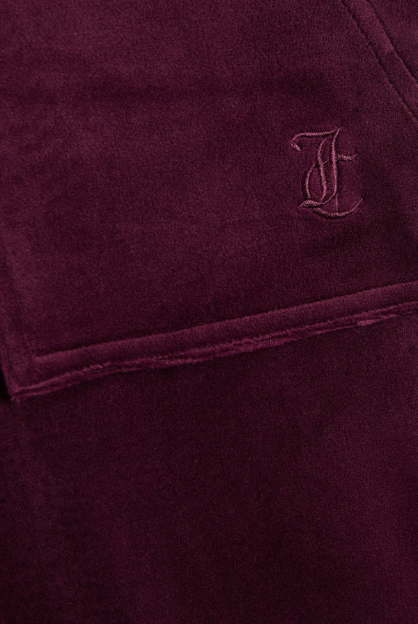Displays the Winetasting & Gold 'Juicy' branded Low Rise Flare Classic Velour Track Pant featuring the juicy couture logo branding