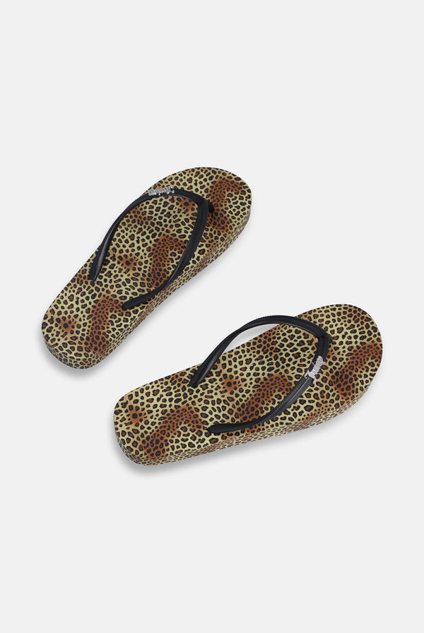 Displays the Leopard Print 'Juicy' branded platform flip flop 