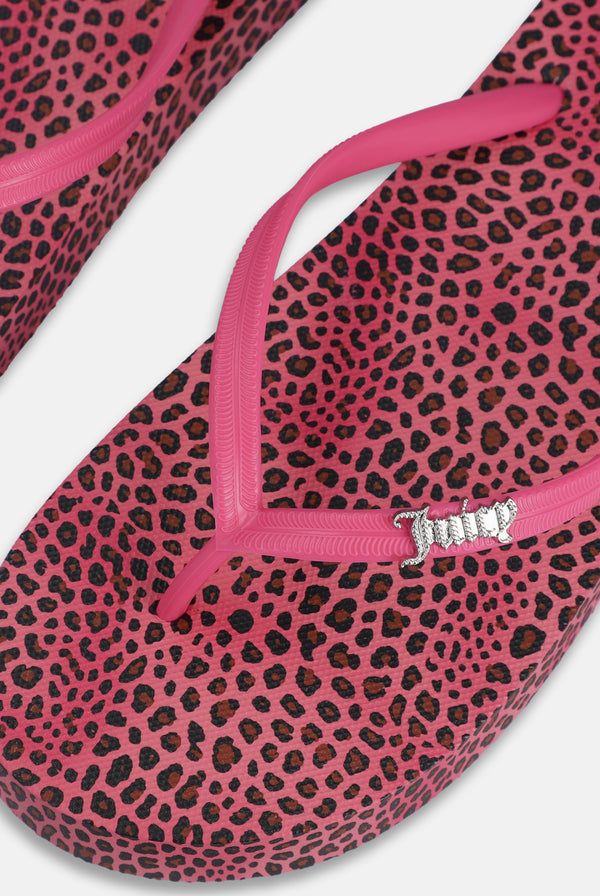 Displays the Pink Cheetah Print 'Juicy' branded platform flip flop 