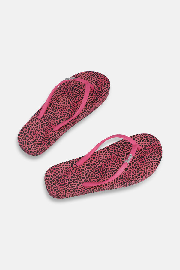 Displays a pair of the Pink Cheetah Print 'Juicy' branded platform flip flop 