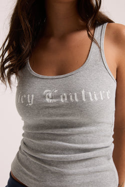 Displays a model wearing the Silver Marl 'Juicy' branded longline ribbed vest 