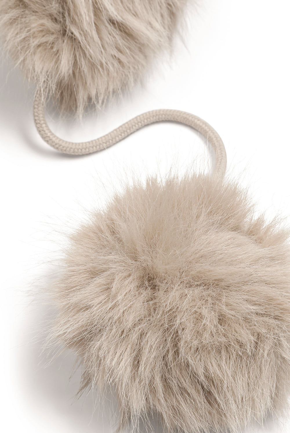 Displays the Natural 'Juicy' branded Long Pile Trapper Hat featuring the close up on the details 