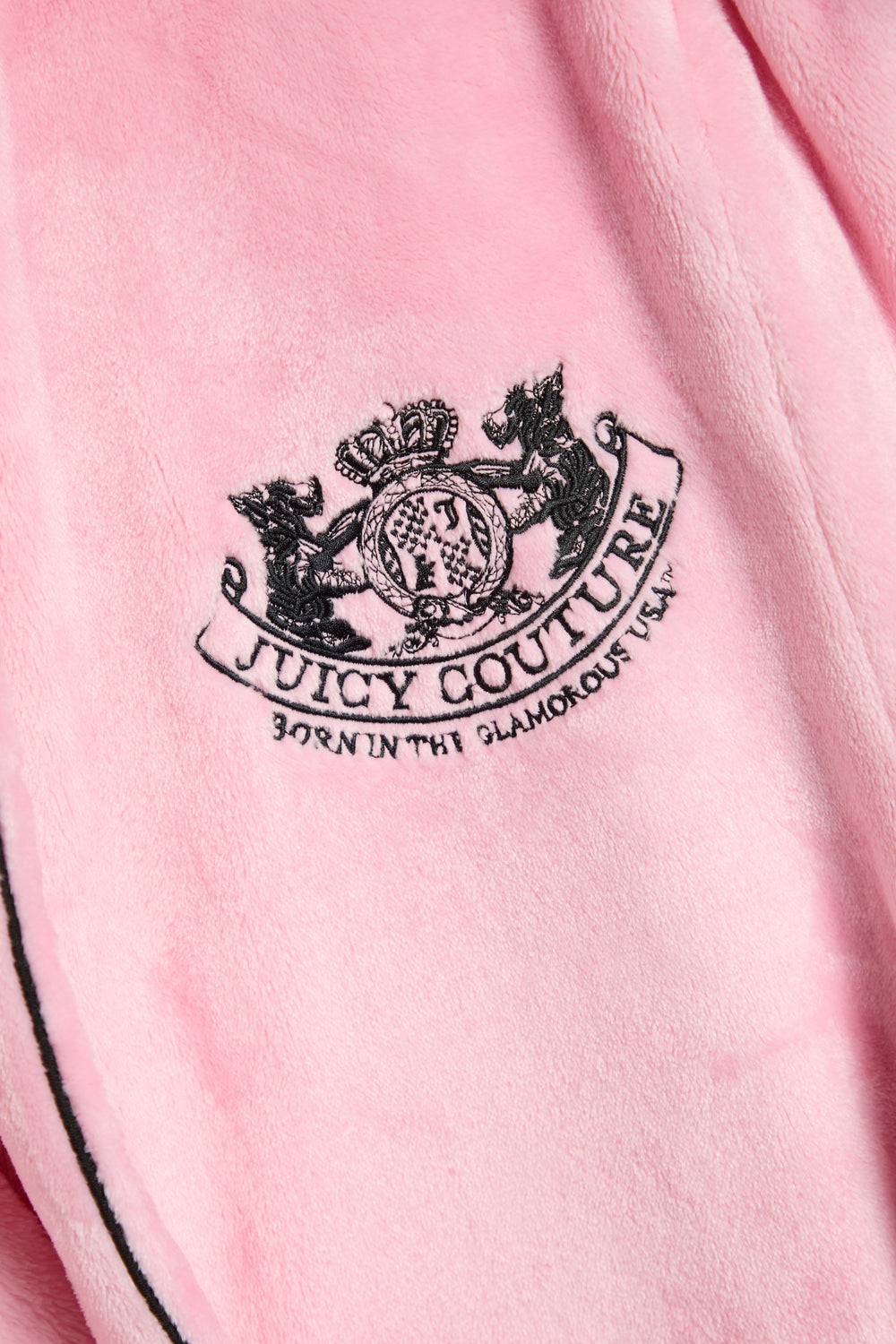 Displays the Juicy Pink 'Juicy' branded Plush Crest Robe featuring the juicy logo branding