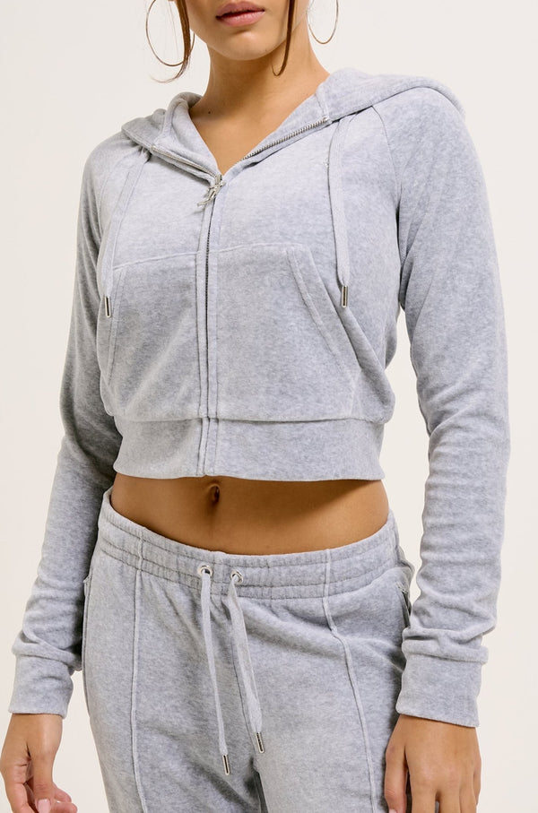 Displays a model wearing the Silver Marl Diamanté 'Juicy' branded cotton velour zip-through hoodie