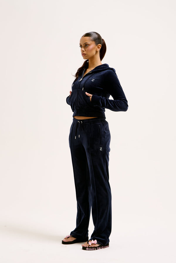 Displays a model wearing the Night Sky Diamanté 'Juicy' branded velour zip-through hoodie  