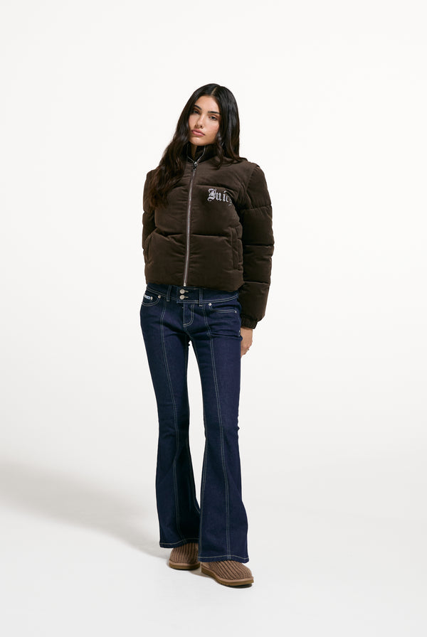 Displays a model wearing the Java 'Juicy' branded Old Gothic Diamanté Puffa Jacket