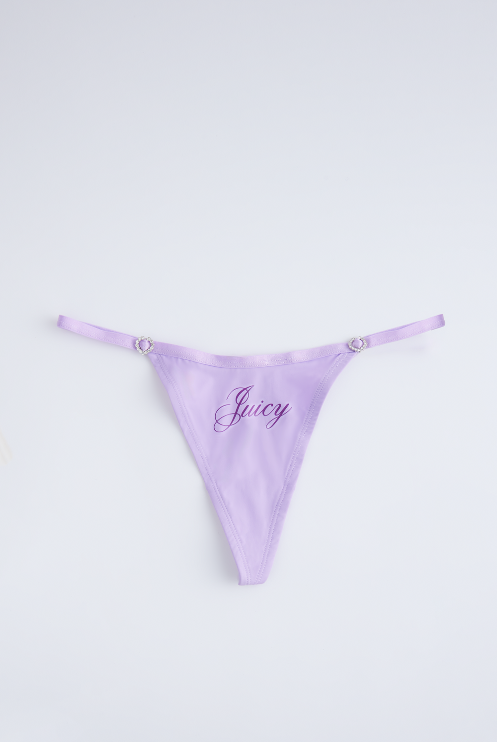 Displays the purple 'Juicy' branded microfibre script print thong