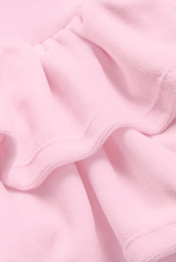 Displays the Cherry Blossom 'Juicy' branded Cotton Velour Ruffle Skirt featuring the close up on the details