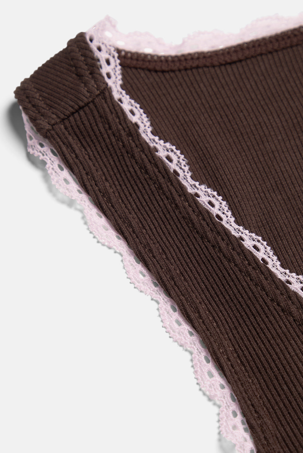 Displays the Java 'Juicy' branded Lace Trim Vest featuring the close up on the details 