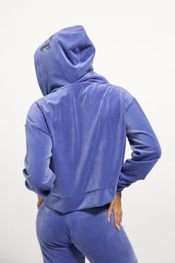Displays a model wearing Greyblue 'Juicy' branded Old Gothic Oversized Cropped Hoodie