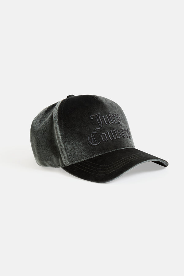Displays the green 'juicy' branded velour juicy couture cap 