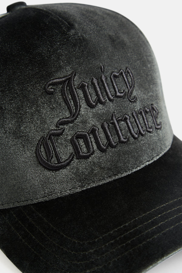 Displays the green 'juicy' branded velour juicy couture cap featuring the juicy branding 
