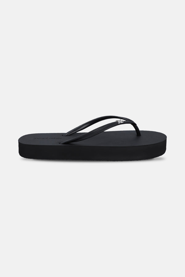 Displays the Black 'Juicy' branded plain platform flip flop 