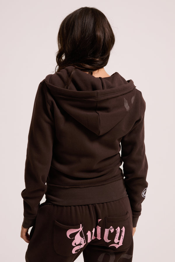 Displays a model wearing the Java longline 'Juicy' branded fleece zip through hoodie 