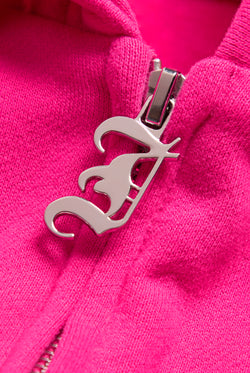 Displays the Nostalgia Pink 'Juicy' branded Longline Fleece Zip-Through Hoodie featuring the juicy branding on the zip 