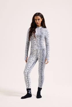 Displays a model wearing the Ski Snow Leopard print 'Juicy' branded long sleeve top 