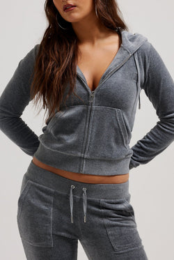 Displays a model wearing the Charcoal Marl 'Juicy' cotton velour Robertson hoodie 