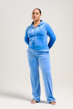 Displays a model wearing the Regatta 'Juicy' branded classic velour Robertson hoodie 