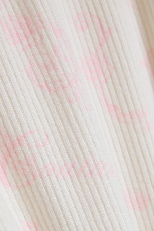 Displays the Marshmallow 'Juicy' branded Rose Rib Pyjama Set features close up on the details