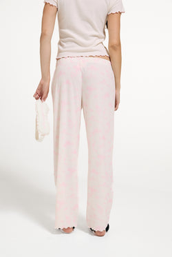 Displays a model wearing the Marshmallow 'Juicy' branded Rose Rib Pyjama Set