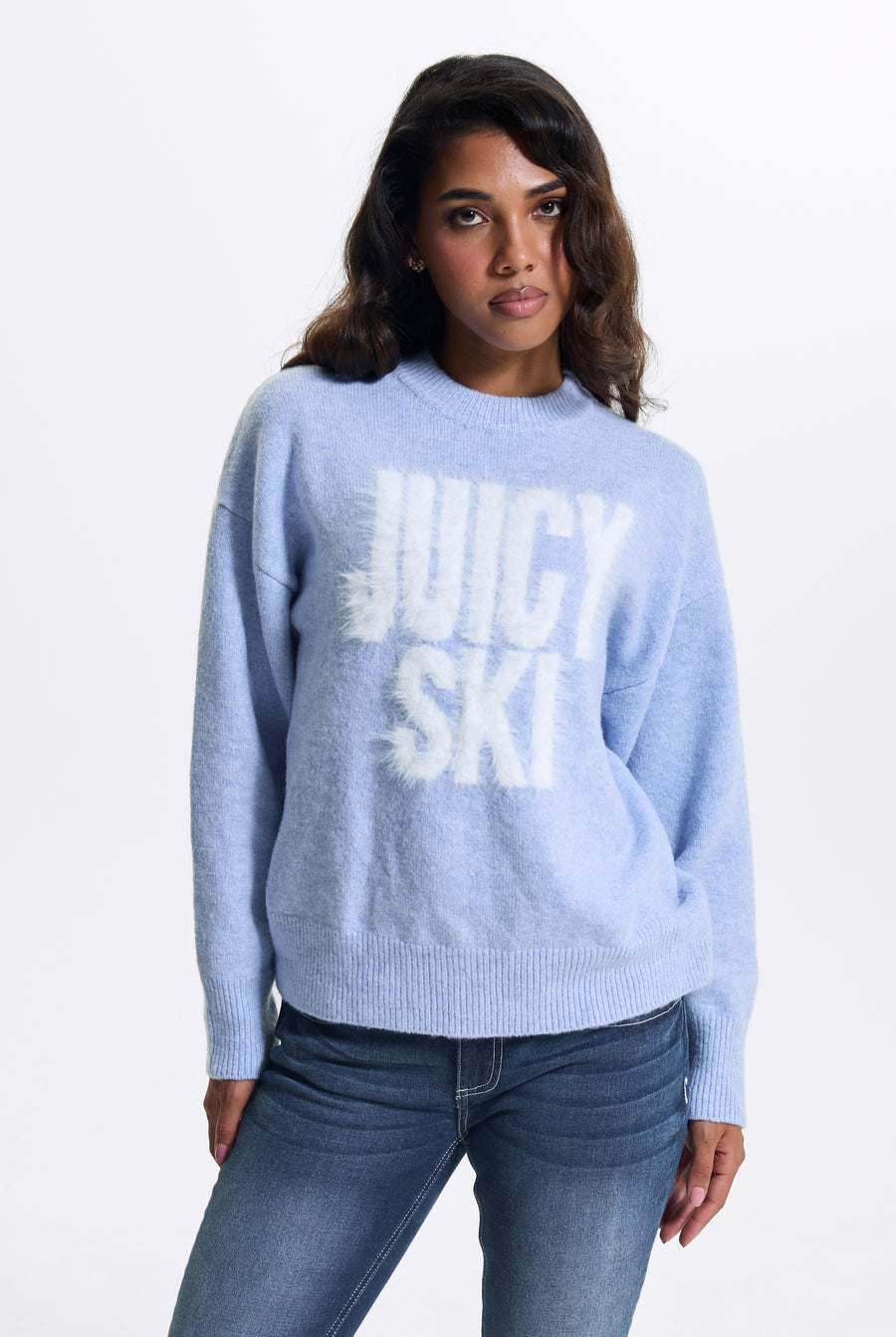 Displays a model wearing the Powder Blue 'Juicy' branded Juicy Ski Knit Jumper