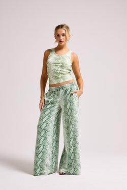 Displays a model wearing the Green Snake print 'Juicy' branded diamanté vest 
