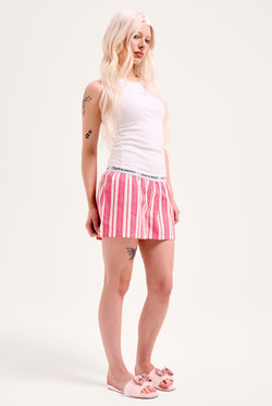 Displays a model wearing the Pink Stripe 'Juicy' branded cotton boxer 