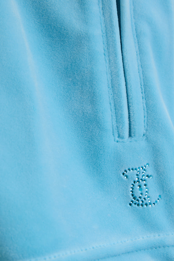 Displays the Sky Blue 'juicy' branded Velour outline diamanté track shorts featuring the juicy branding 