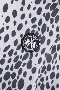 Displays the Ski Snow Leopard print 'Juicy' branded long sleeve top featuring the logo