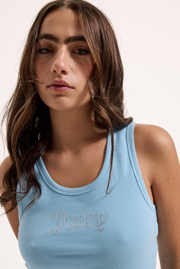 Displays a model wearing the sky blue 'juicy' branded outline diamanté racer vest 