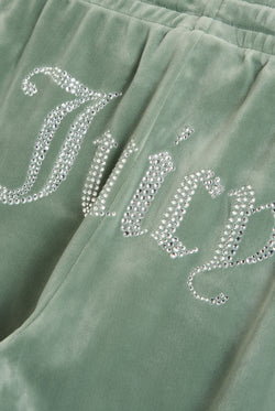 Displays the chinois green 'Juicy' velour diamanté tracksuit bottom featuring the juicy branding 