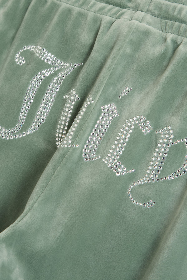 Displays the chinois green 'Juicy' velour diamanté tracksuit bottom featuring the juicy branding 