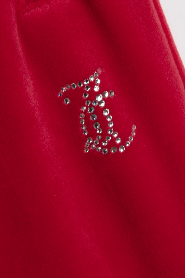 Displays the Astor Red Velour 'Juicy' branded Diamanté tracksuit bottoms featuring the logo 
