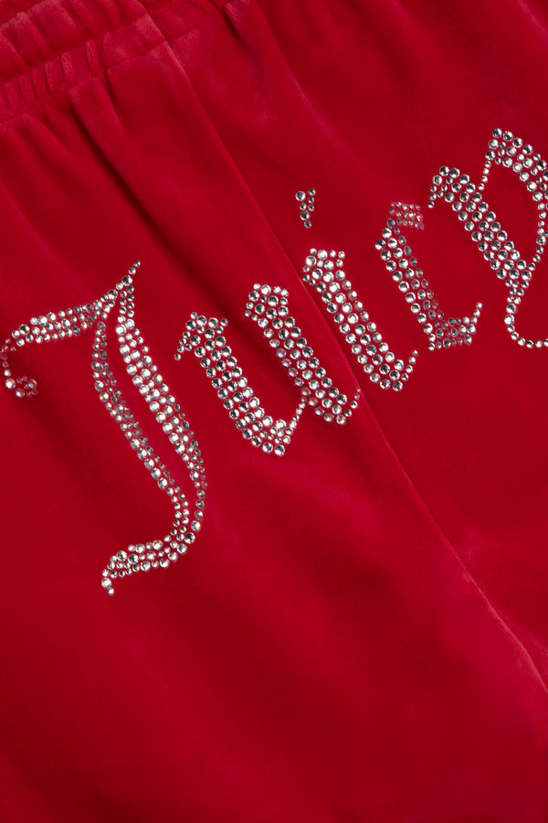 Displays the Astor Red Velour 'Juicy' branded Diamanté tracksuit bottoms featuring the logo 