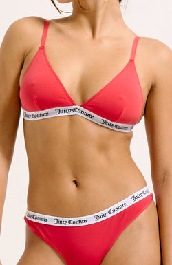 Displays a model wearing the Astor Red 'Juicy' branded cotton triangle bra 