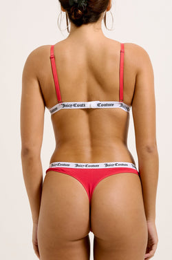 Displays a model wearing the Astor Red 'Juicy' branded cotton triangle bra 