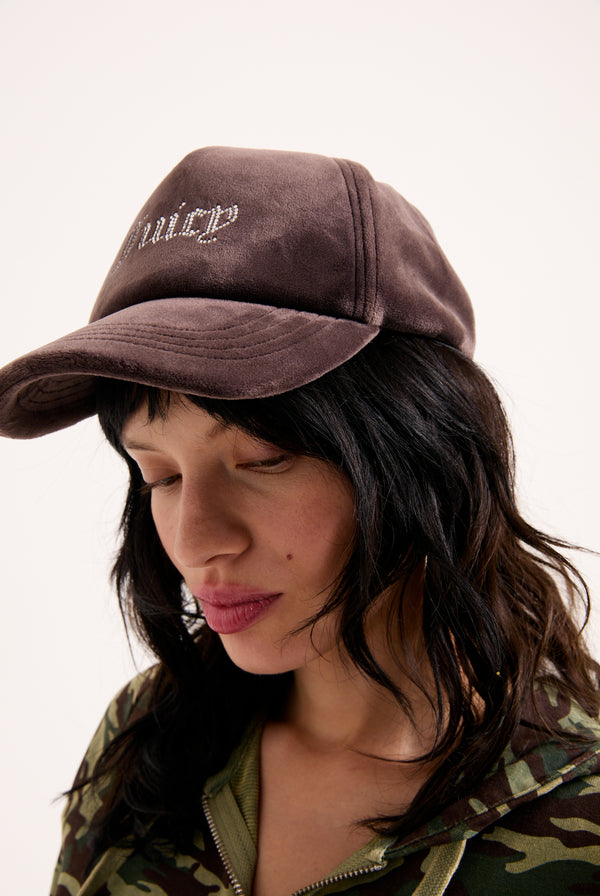 Displays a model wearing the Java 'Juicy' branded Diamanté velour baseball cap