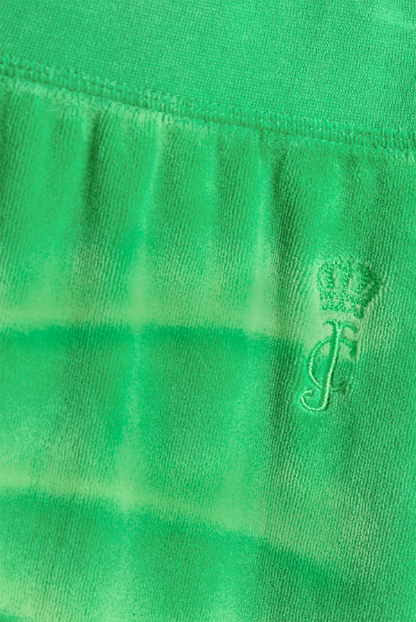 Displays the Jolly Green washed 'Juicy' branded OG straight track pant featuring the juicy Couture logo