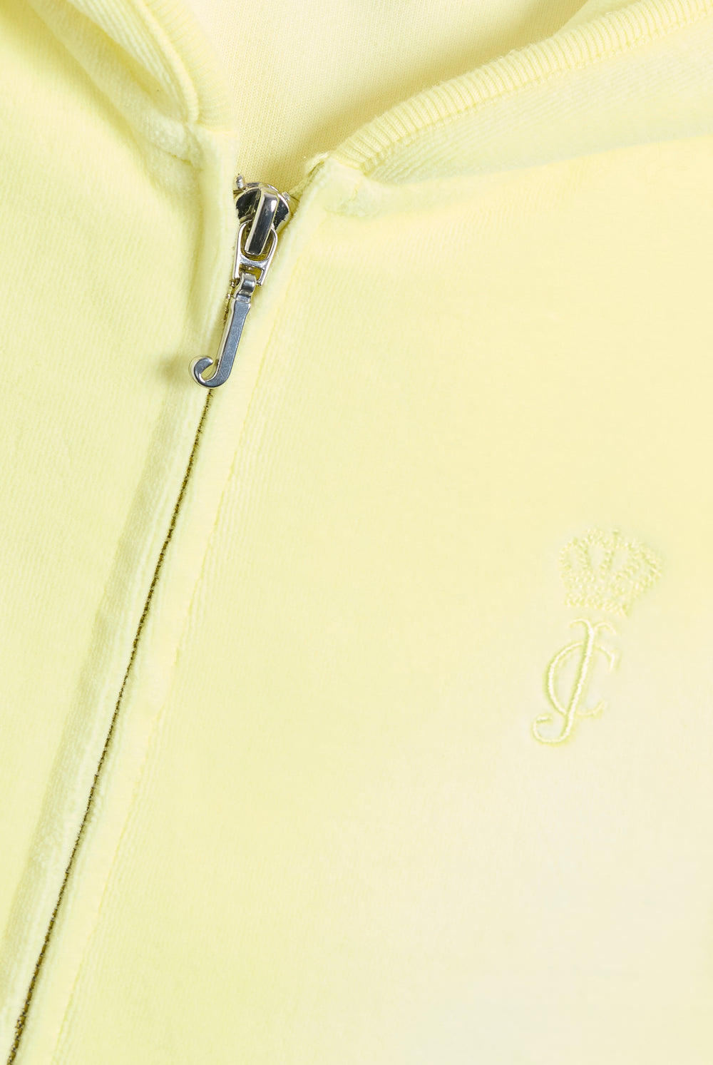 Display the Yellow Pear washed 'Juicy' branded cotton velour fitted hoodie featuring the juicy zip 