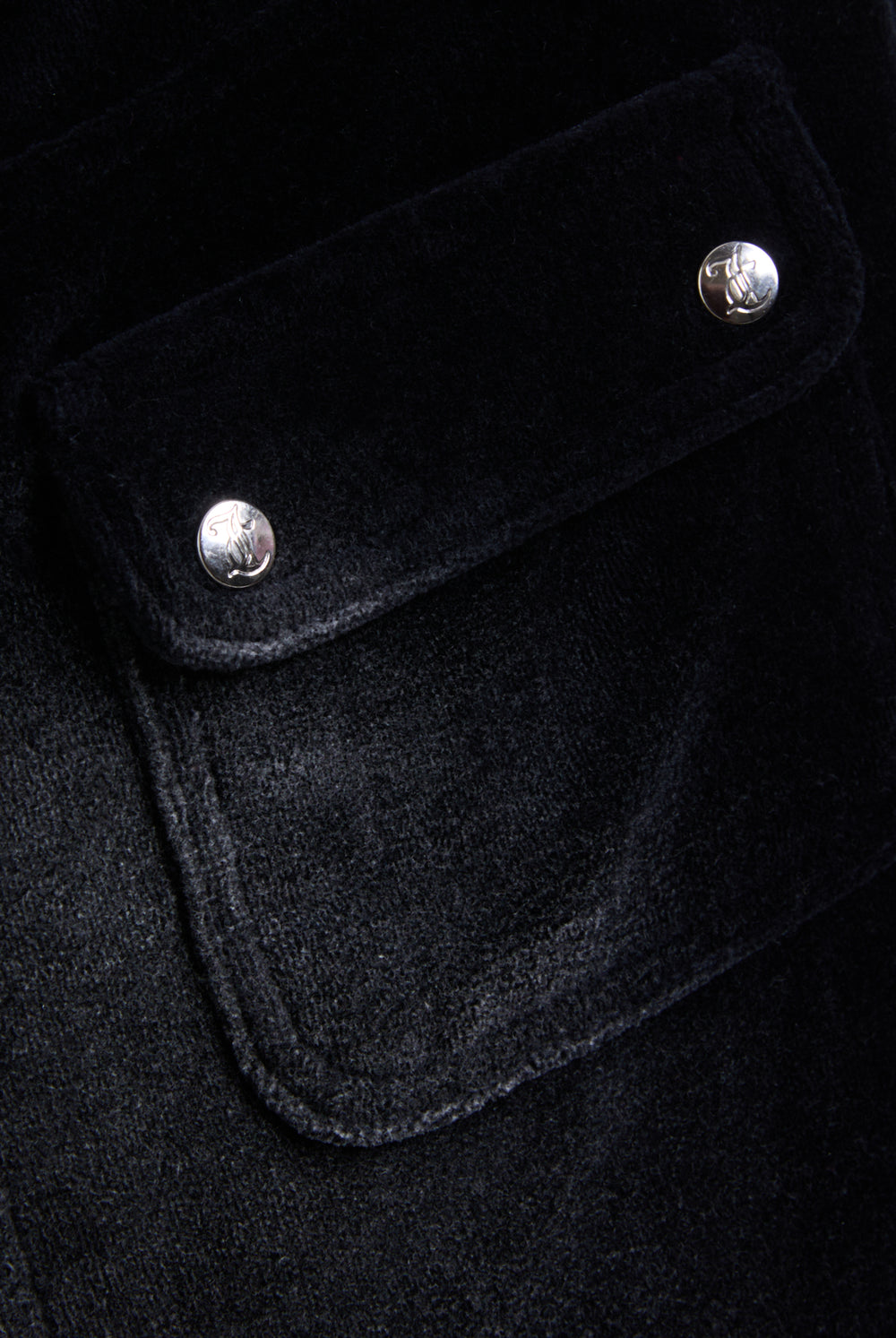 Displays the Washed Black 'Juicy' branded Cotton velour mini skirt 
