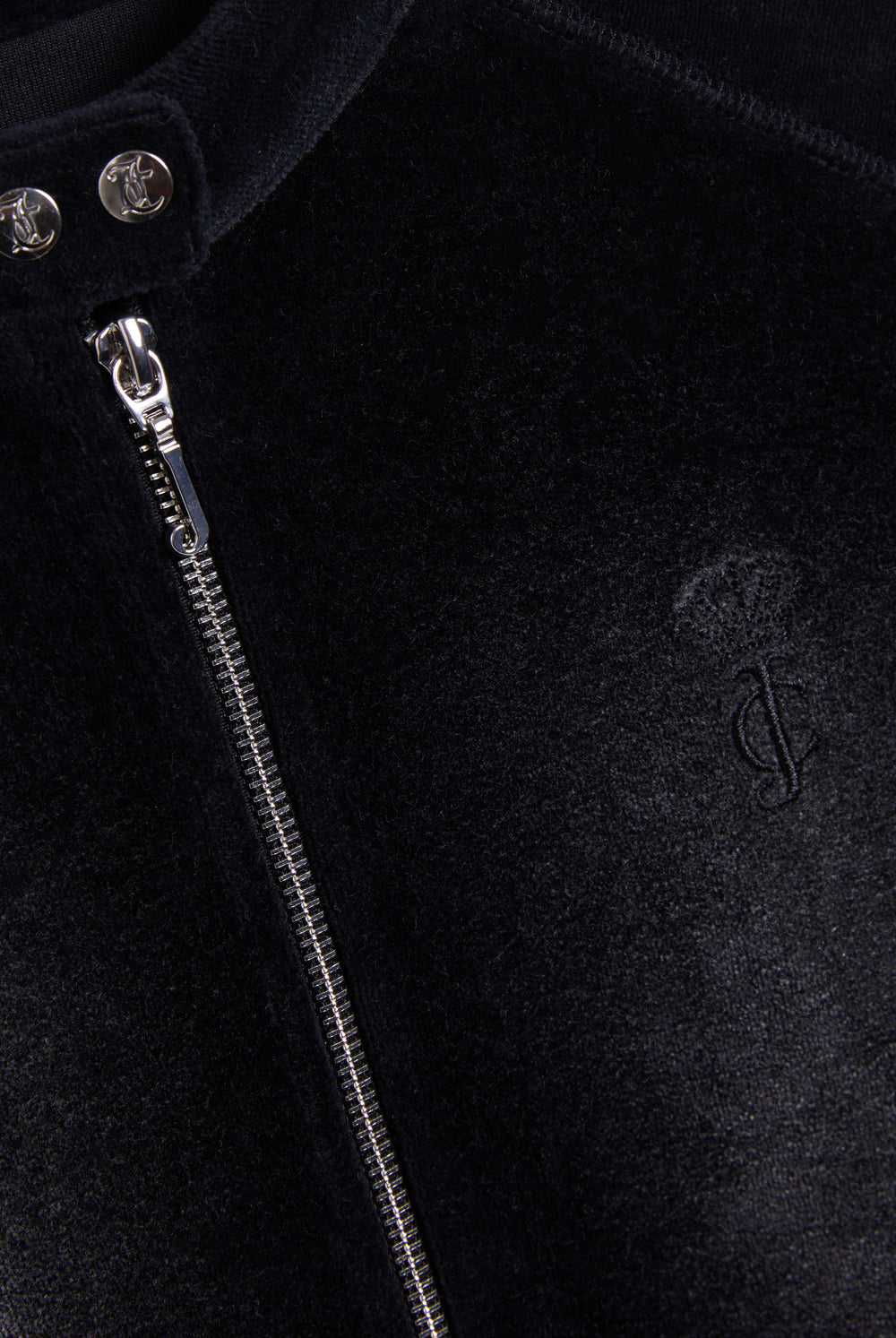 Displays the washed black 'juicy' branded cotton velour moto jacket featuring the juicy Couture logo and zip